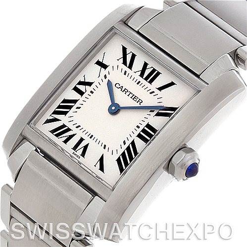 This image displays a close-up of the Cartier Tank Francaise Women's Stainless Steel Silver Dial Women's Stainless Steel Silver Dial watch from a side angle, showcasing the face, bracelet, and crown with a blue cabochon.