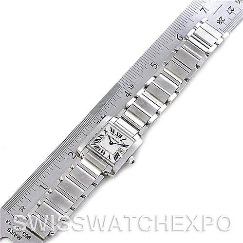 The image shows a Cartier Tank Francaise W51011Q3 Women's Stainless Steel Silver Dial W51011Q3 Women's Stainless Steel Silver Dial watch laid flat next to a ruler, emphasizing its bracelet length and face dimensions.