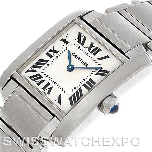 The Cartier Tank Française watch is shown at an angled view displaying its rectangular dial, Roman numerals, and part of its metal bracelet.