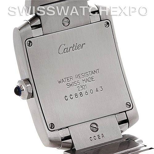 The image shows the back casing of a Cartier Tank Francaise Women's Stainless Steel Silver Dial Women's Stainless Steel Silver Dial watch, highlighting the brand engraving, serial number, and water resistance details.