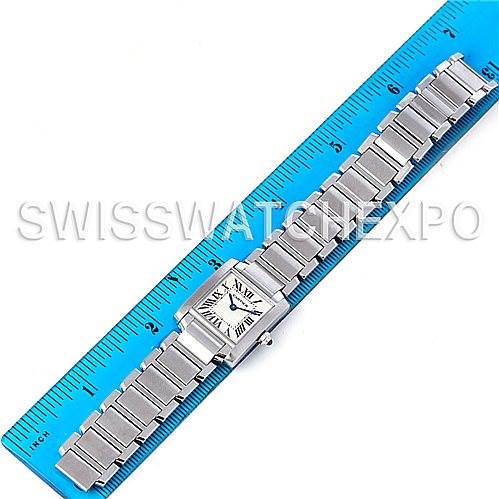 The Tank Francaise model by Cartier is shown from the top view, displaying the entire watch and bracelet against a ruler for scale.