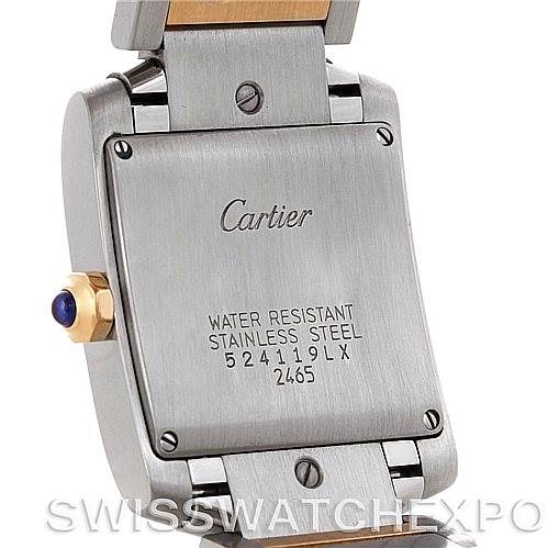 This image shows the back case of a Cartier Tank Française watch, highlighting the brushed stainless steel and engraved details.