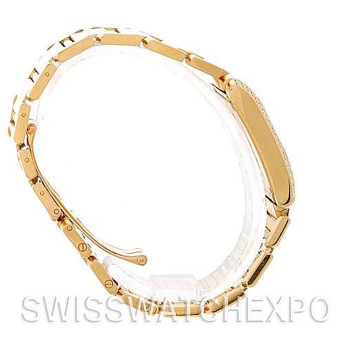 The image shows a side view of the Cartier Tank Francaise WE1017R8 Women's Yellow Gold Silver Dial WE1017R8 Women's Yellow Gold Silver Dial watch, highlighting its gold bracelet and case.