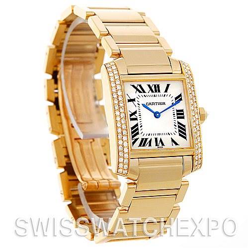 The image shows a Cartier Tank Francaise WE1017R8 Women's Yellow Gold Silver Dial WE1017R8 Women's Yellow Gold Silver Dial watch from an angled front-left view, highlighting the face, bracelet, and diamond accents.