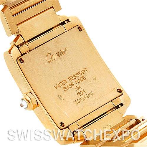 This image shows the back case and clasp of a Cartier Tank Francaise WE1017R8 Women's Yellow Gold Silver Dial WE1017R8 Women's Yellow Gold Silver Dial watch at an angled close-up view.