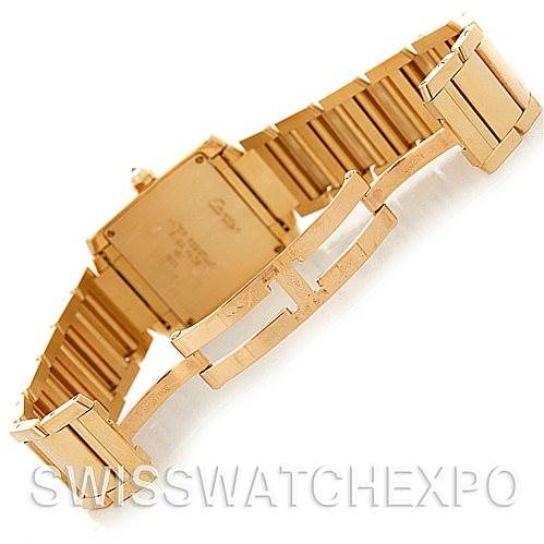 The image shows the gold back and bracelet clasp of a Cartier Tank Francaise WE1017R8 Women's Yellow Gold Silver Dial WE1017R8 Women's Yellow Gold Silver Dial watch, with the bracelet opened to reveal its links.