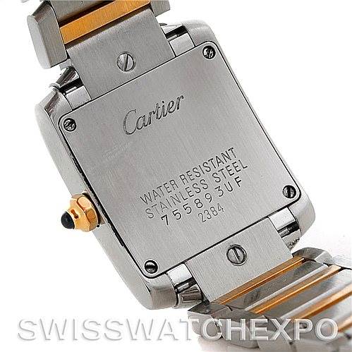 This image shows the back case and part of the bracelet of a Cartier Tank Francaise W51007Q4 Women's Steel and Gold (two tone) Silver Dial W51007Q4 Women's Steel and Gold (two tone) Silver Dial watch, highlighting its stainless steel and water resistance details.