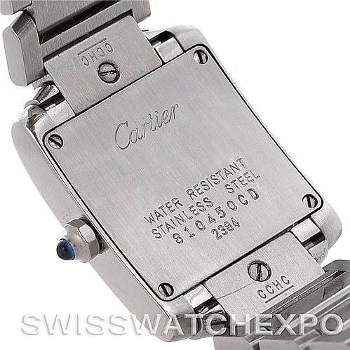 The image shows the back case and part of the bracelet of a Cartier Tank Française watch.