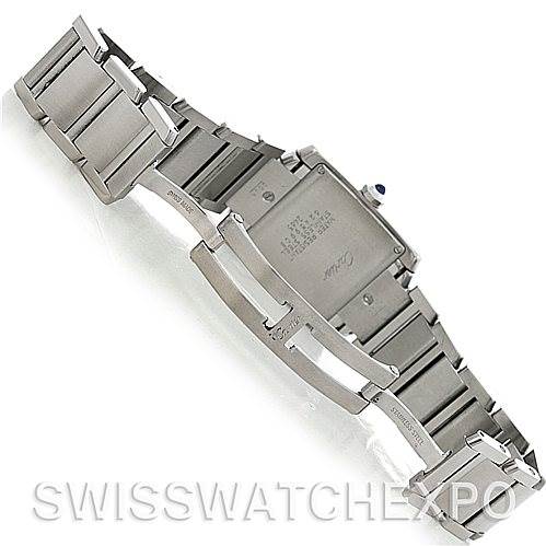 This image shows the back of a Tank Francaise model by Cartier, highlighting the metal bracelet and clasp.