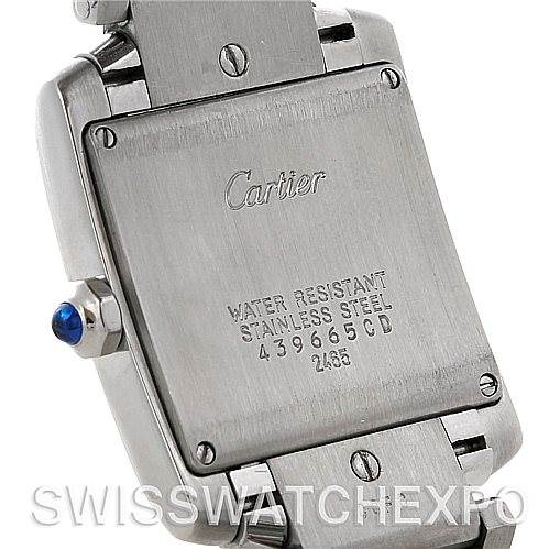 The image shows the back case of a Cartier Tank Francaise W51011Q3 Women's Stainless Steel Silver Dial W51011Q3 Women's Stainless Steel Silver Dial watch, displaying the brand name, model details, and a blue gemstone on the crown.
