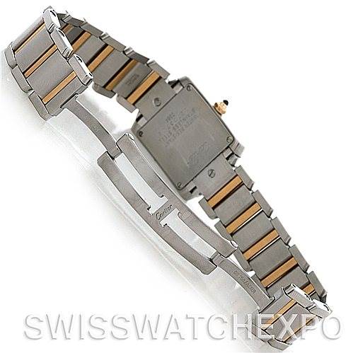 The image shows the back and bracelet of a Cartier Tank Française watch, highlighting its clasp and two-tone metal design.