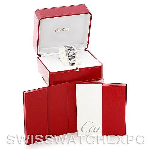 The image shows a Cartier Tank Française watch in its open red box, alongside its packaging and certificate holder.
