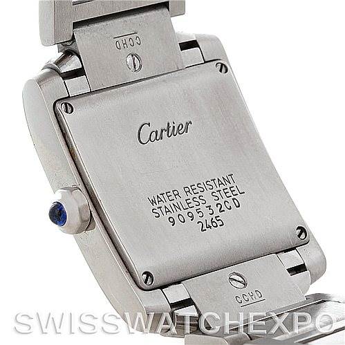 This image shows the case back of a Cartier Tank Francaise W51011Q3 Women
s Stainless Steel Silver Dial W51011Q3 Women
s Stainless Steel Silver Dial watch, highlighting its water resistance, stainless steel material, and serial numbers.