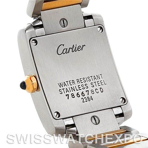 This image shows the back of a Cartier Tank Française watch, highlighting its case back with inscriptions, lugs, and part of the bracelet.