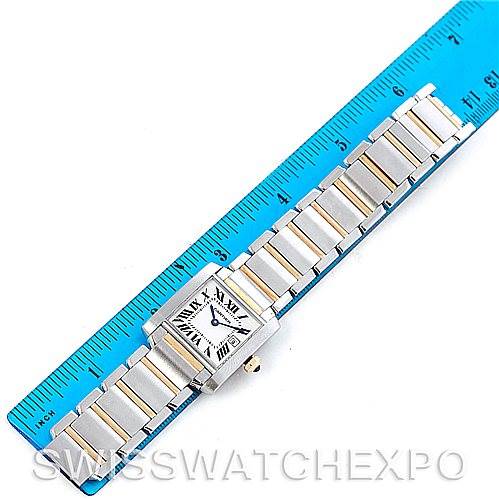 The Cartier Tank Francaise W51012Q4 Women's Steel and Gold (two tone) Silver Dial W51012Q4 Women's Steel and Gold (two tone) Silver Dial watch is shown from above, displaying the face and full bracelet next to a blue ruler for scale.