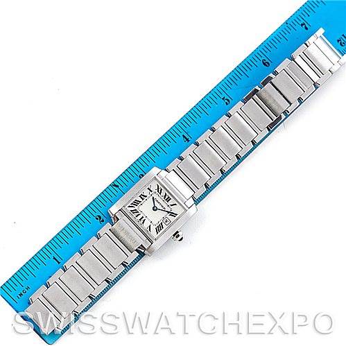 This image shows the Rolex President W51011Q3 Women's Platinum Silver Dial W51011Q3 Women's Platinum Silver Dial model watch from an overhead angle, including its band and face, next to a blue ruler for size reference.
