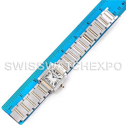 The Cartier Tank Francaise W51012Q4 Women's Steel and Gold (two tone) Silver Dial W51012Q4 Women's Steel and Gold (two tone) Silver Dial watch is shown from the top view, highlighting the face and full bracelet against a ruler for scale.