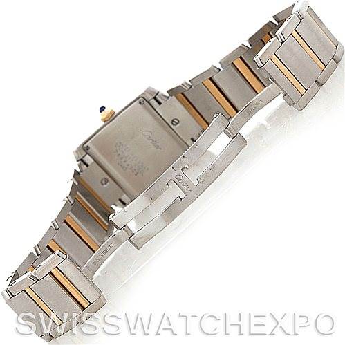 The Tank Française model by Cartier is shown from the back, highlighting the clasp and bracelet.