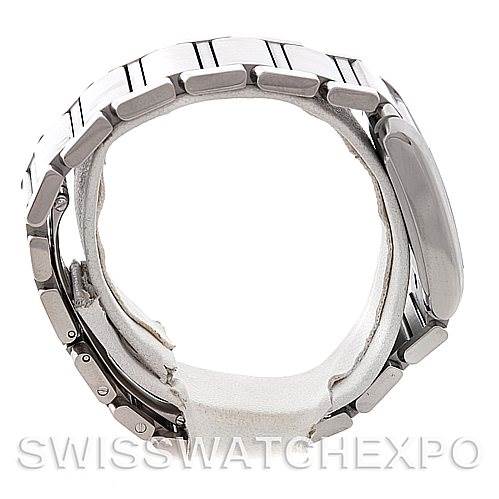 The image shows a side view of a Cartier Tank Francaise W51011Q3 Women's Stainless Steel Silver Dial W51011Q3 Women's Stainless Steel Silver Dial watch, focusing on the bracelet links and the case profile.