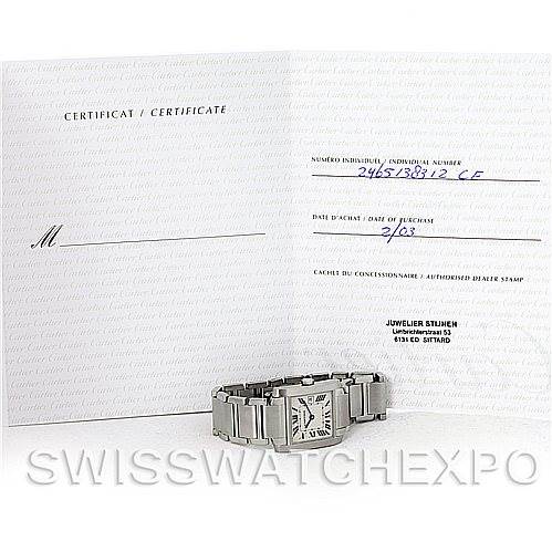 The image shows a Cartier Tank Francaise W51011Q3 Women's Stainless Steel Silver Dial W51011Q3 Women's Stainless Steel Silver Dial model watch laid flat beside its open certificate.