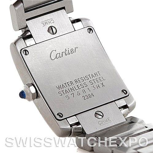 This image shows the back case of a Cartier Tank Française watch, highlighting engravings and the stainless steel bracelet attachment.