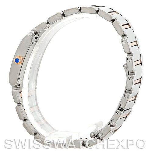 This image shows a side view of the Cartier Tank Francaise W51027Q4 Women's Steel and Gold (two tone) Mother of Pearl Dial W51027Q4 Women's Steel and Gold (two tone) Mother of Pearl Dial watch, highlighting its stainless steel bracelet and crown with a blue cabochon.