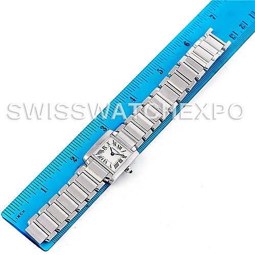 The Cartier Tank Francaise W51008Q3 Women's Stainless Steel Silver Dial W51008Q3 Women's Stainless Steel Silver Dial watch is shown laid flat next to a blue ruler for measurement.