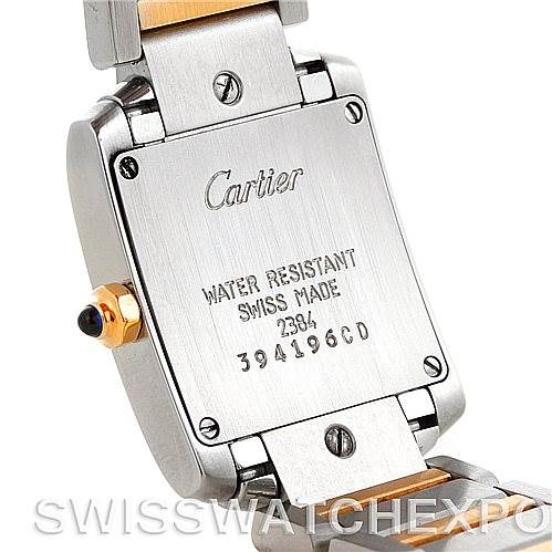 This image shows the back case and part of the bracelet of a Cartier Tank Francaise W51007Q4 Women's Steel and Gold (two tone) Silver Dial W51007Q4 Women's Steel and Gold (two tone) Silver Dial watch.