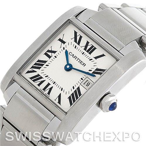 The image shows an angled view of the Cartier Tank Francaise W51011Q3 Women's Stainless Steel Silver Dial W51011Q3 Women's Stainless Steel Silver Dial watch, highlighting the face, Roman numerals, blue sword-shaped hands, and metal bracelet.
