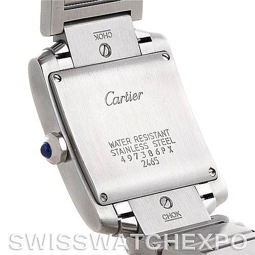 This image shows the back case of a Cartier Tank Française watch, featuring the brand name, water resistance details, and a stainless steel bracelet.