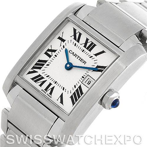 The image shows an angled close-up of the Cartier Tank Française watch face, displaying Roman numerals, blue hands, and a date window.