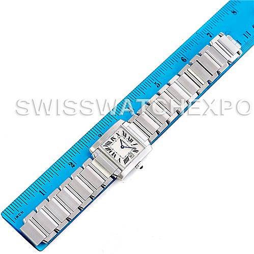 The image shows a top view of a Cartier Tank Francaise W51011Q3 Women's Stainless Steel Silver Dial W51011Q3 Women's Stainless Steel Silver Dial watch laid next to a ruler for scale.