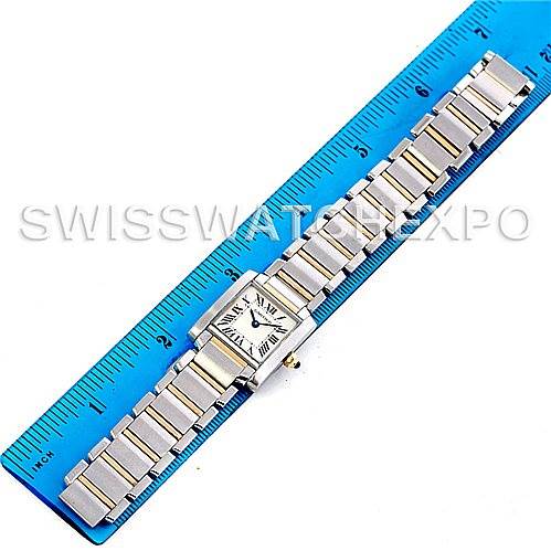 The image shows a top-down view of a Cartier Tank Francaise W51007Q4 Women's Steel and Gold (two tone) Silver Dial W51007Q4 Women's Steel and Gold (two tone) Silver Dial watch next to a blue ruler for scale.