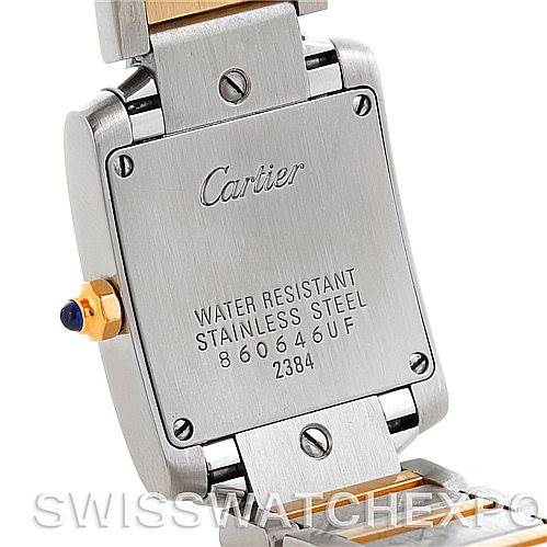 This image shows the back case and part of the bracelet of a Cartier Tank Française watch at an angled view.