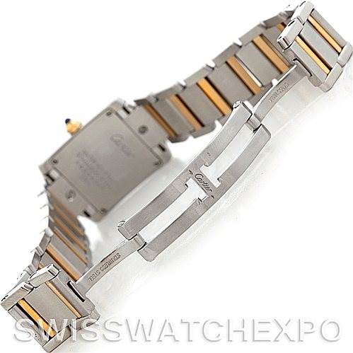The image shows the back view of a Cartier Tank Française watch, highlighting its two-tone stainless steel and gold bracelet and clasp.