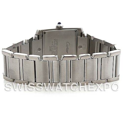 The image shows the back view of the Cartier Tank Française watch, focusing on the stainless steel bracelet and clasp.