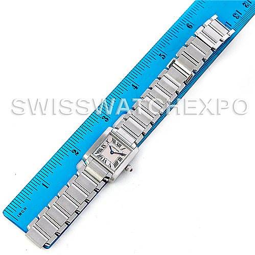 The Cartier Tank Francaise W51028Q3 Women's Stainless Steel Mother of Pearl Dial W51028Q3 Women's Stainless Steel Mother of Pearl Dial watch is shown laid flat with a blue ruler for size reference.