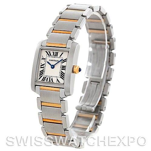 The Cartier Tank Francaise W51007Q4 Women's Steel and Gold (two tone) Silver Dial W51007Q4 Women's Steel and Gold (two tone) Silver Dial watch is shown angled to display the rectangular face, bracelet, and signature blue cabochon crown.