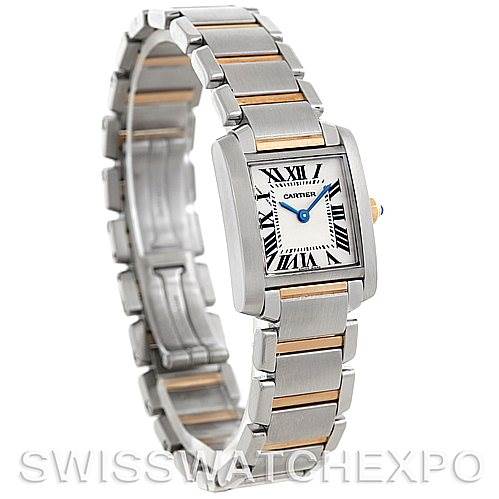 The image shows a three-quarter view of a Cartier Tank Francaise W51007Q4 Women's Steel and Gold (two tone) Silver Dial W51007Q4 Women's Steel and Gold (two tone) Silver Dial watch, highlighting its face, bracelet, and clasp.