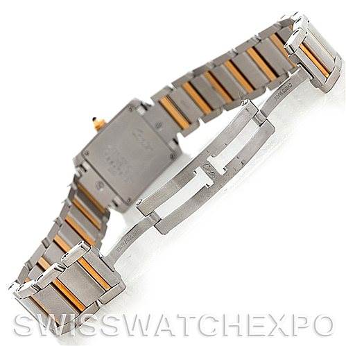 The image shows the back and bracelet of a Cartier Tank Française watch, highlighting its two-tone metal design and deployment clasp.