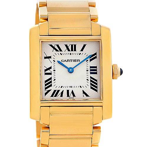 This image shows a frontal view of the Cartier Tank Française watch, highlighting its gold case, Roman numeral dial, and bracelet.