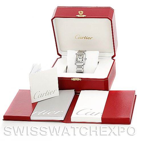 The image shows a Cartier Tank Française watch front view, displayed in a red Cartier box with accompanying booklets.