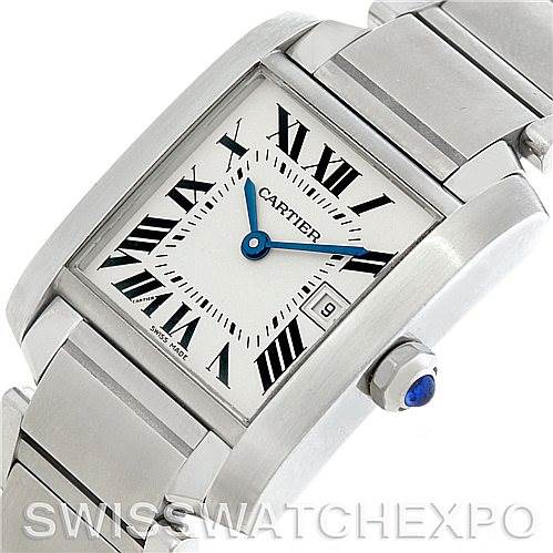 The image shows a Cartier Tank Francaise W51011Q3 Women's Stainless Steel Silver Dial W51011Q3 Women's Stainless Steel Silver Dial watch angled from the side/front, highlighting its dial, bracelet, and crown with a blue cabochon.