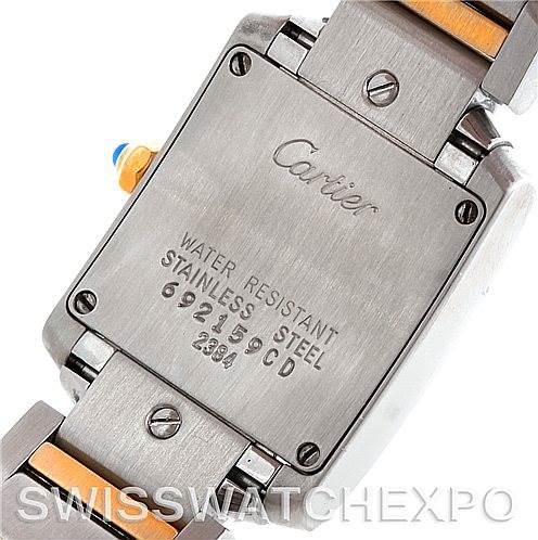 The image shows the back case and part of the bracelet of a Cartier Tank Francaise W51007Q4 Women's Steel and Gold (two tone) Silver Dial W51007Q4 Women's Steel and Gold (two tone) Silver Dial watch, highlighting the stainless steel material and inscriptions.