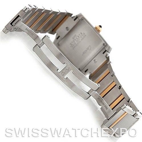 This image shows the clasp and back of the Cartier Tank Française watch, focusing on its metal bracelet and deployment clasp.