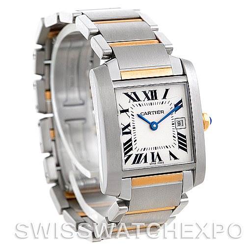 This image shows a Cartier Tank Francaise W51012Q4 Women's Steel and Gold (two tone) Silver Dial W51012Q4 Women's Steel and Gold (two tone) Silver Dial watch at a slight angle, displaying the dial, bracelet, and part of the crown.