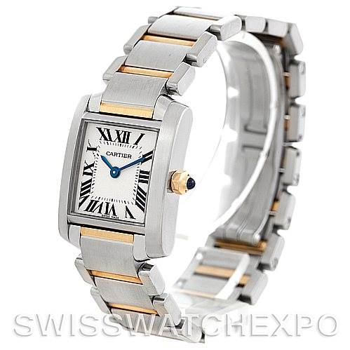 The image shows a Tank Française watch by Cartier at an angle that highlights the face, bezel, and metal bracelet.