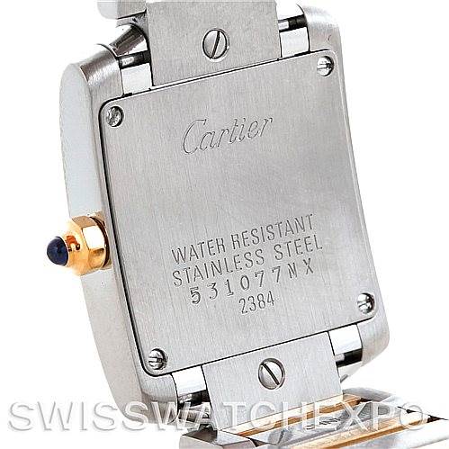 This image shows the back case and part of the clasp of a Cartier Tank Française watch.