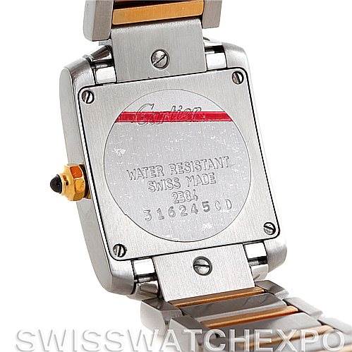 This is the back view of a Cartier Tank Française watch, showing the case back, screws, and part of the bracelet.