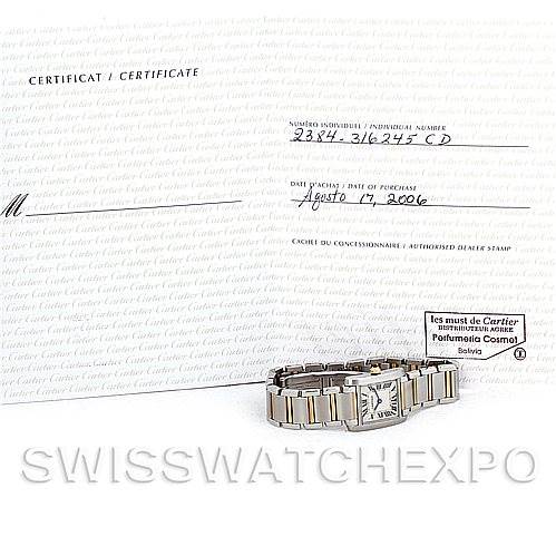 The image displays a Cartier Tank Francaise W51007Q4 Women's Steel and Gold (two tone) Silver Dial W51007Q4 Women's Steel and Gold (two tone) Silver Dial watch laying flat next to its certificate of authenticity.